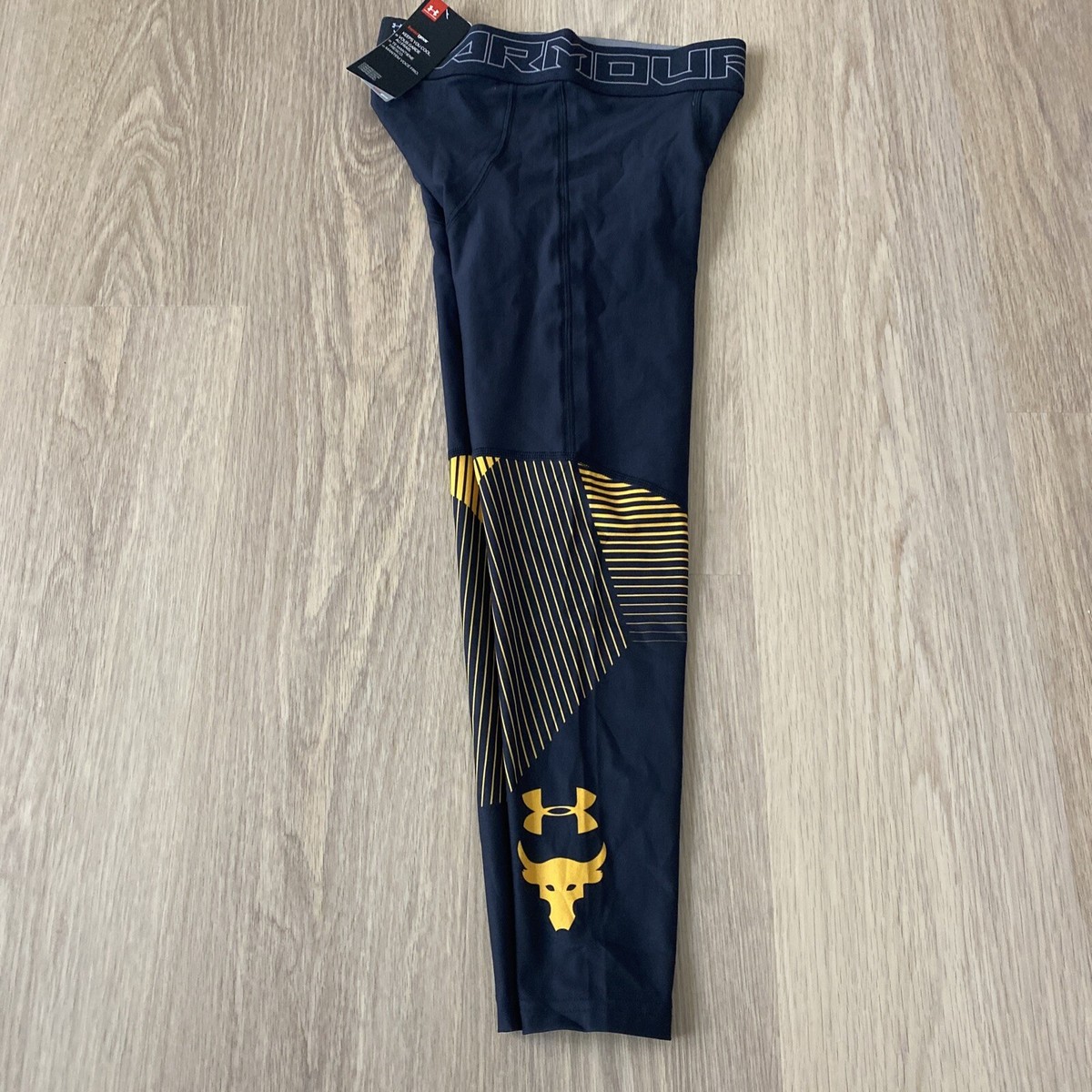 NWT UA PROJECT ROCK 3/4 Black Gold TIGHTS COMPRESSION NWT UA PROJECT ROCK 3/4 Black Gold TIGHTS COMPRESSION