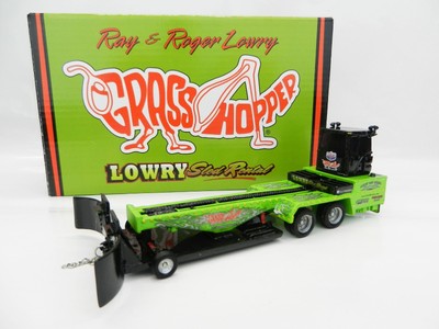 toy tractor pulling sled