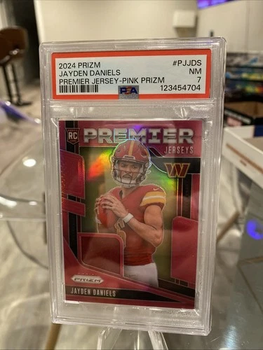 2024 Panini Premier Jersey #PJJDS Jayden Daniels Pink Prizm RC PSA 7