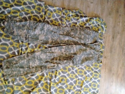 I got a pair of brand new ACU bottoms and a new pair of boots as well.. 100 obo