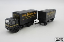 Herpa MAN F8 flatbed/tarpaulin truck and trailer 2-axle/2-axle black/gold "Willy