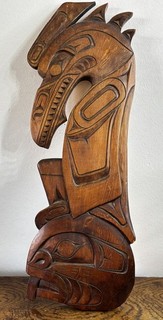 Antique Pacific North West thunderbird and beaver carving