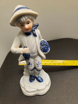 F.E.I. INC. 1985 Porcelain figurine boy man with grapes stamp signed hand painte