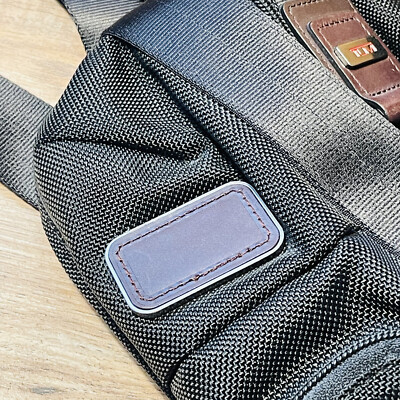 Tumi Alpha Bravo 22318 HKH Monterey Sling Bag Black with Brown