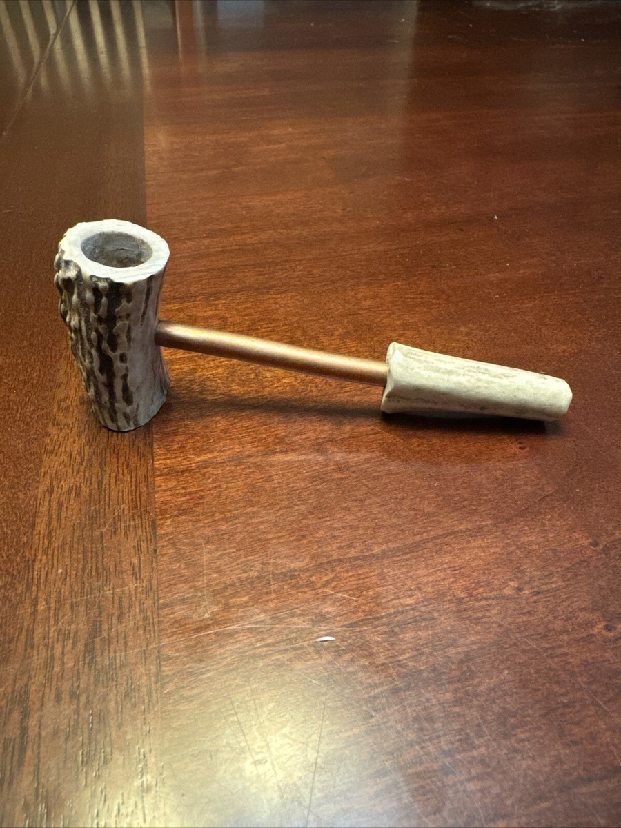deer antler pipe, a tomahawk pipe. smooth cool hit, a pleasure to smoke