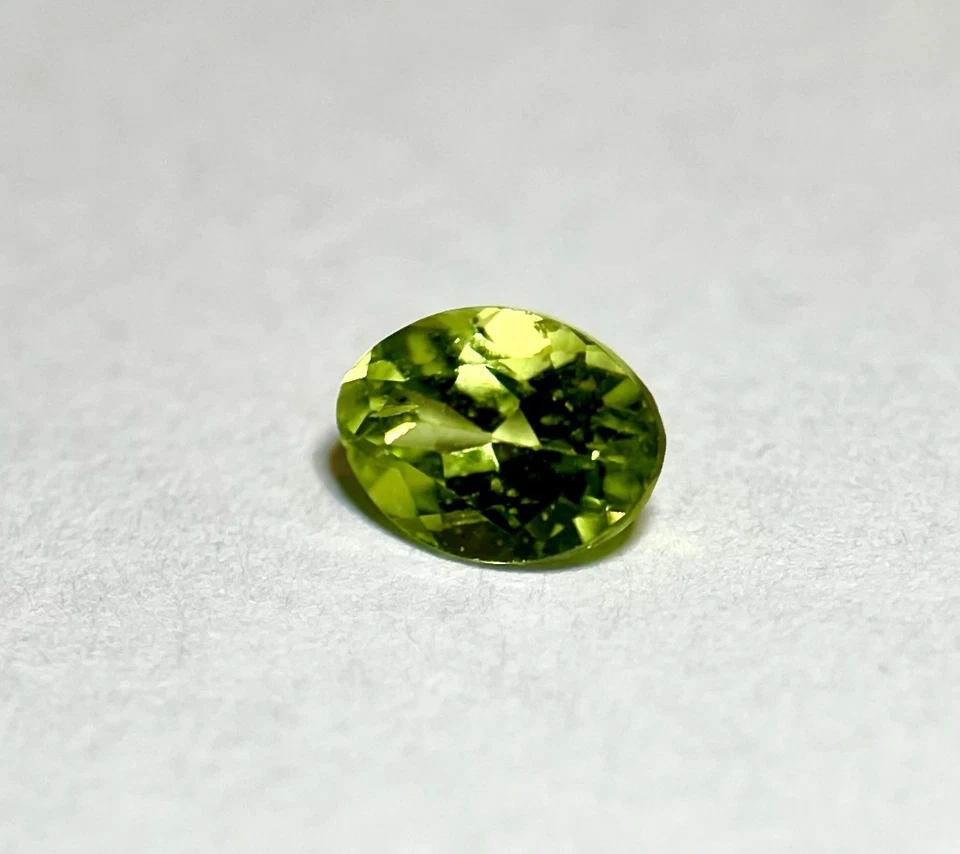 Real Ant Hill Peridot Gemstone With Very Large 7x5 MM Measurements! 0.88 CT - Image 3 of 3