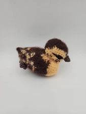 Handmade crocheted little duckling toy