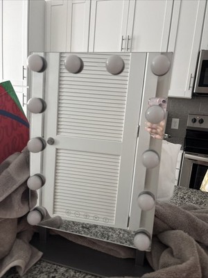 iHome Hollywood Pro mirror. With bluetooth. Built in speakers. Adjust light mode