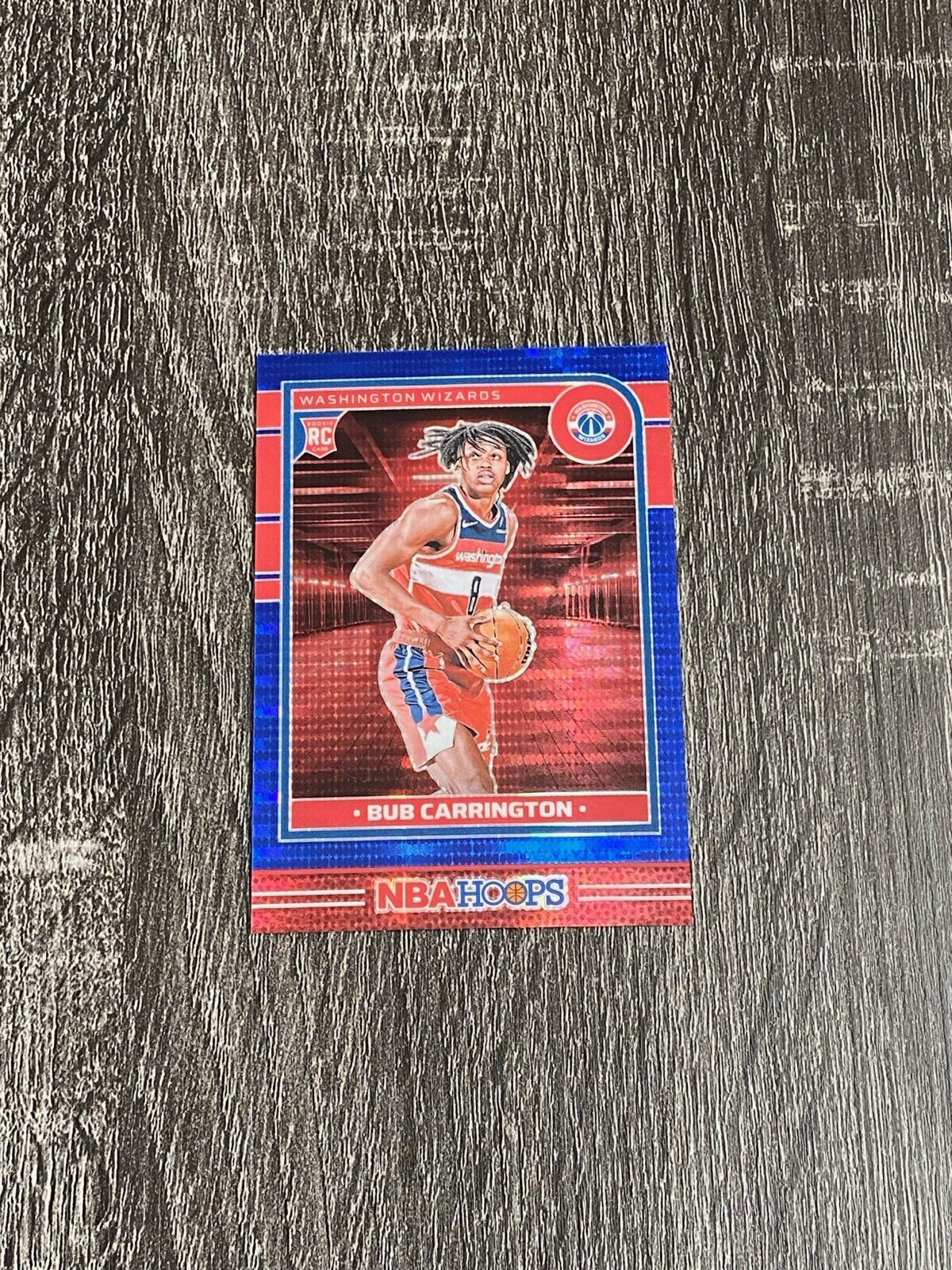 2024-25 Hoops Bub Carrington Pulsar Blue Prizms Premium RC #244 (#’d/99)