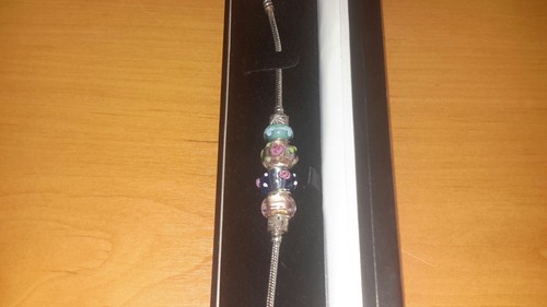 Sterling silver bracelet with four coloured centrepieces. 18.5cm. - Picture 2 of 3