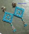 Aquamarine Woven Diamond Drops Handwoven Earrings with crystals and star motif — photo 1