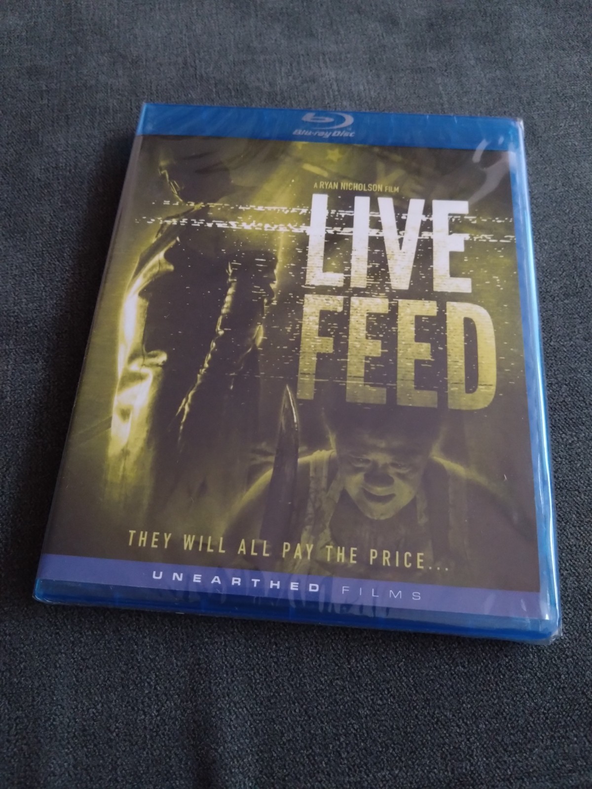 LIVE FEED ( Ryan Nicholson ) - Unearthed US Import Blu Ray - REGION A