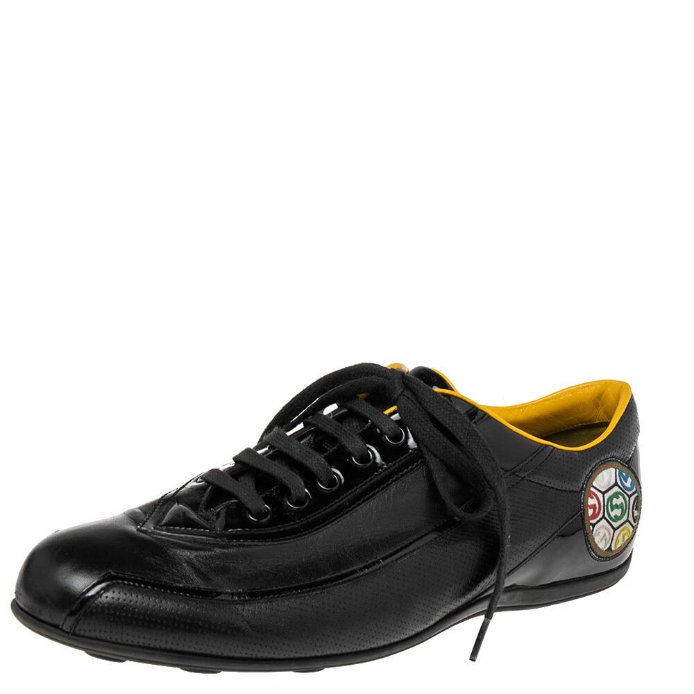 Baskets basses Gucci en cuir noir et brevetées taille 42,5