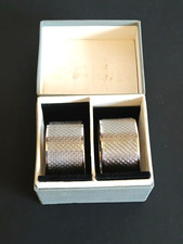 Cased pair of silver Art Deco engine-turned napkin rings superb condition