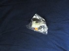 tiny white plastic bunny in package — photo 8
