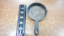 Cenicero pequeño publicitario de hierro fundido antiguo SUPERFLAME ATLANTA