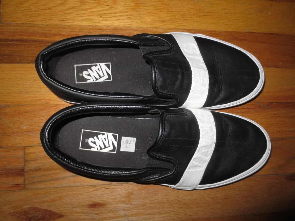 Ladies black clearance slip on vans