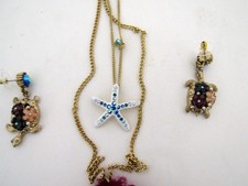 Orecchini a forma di sirena con conchiglie e perle, collezione Sea Treasure