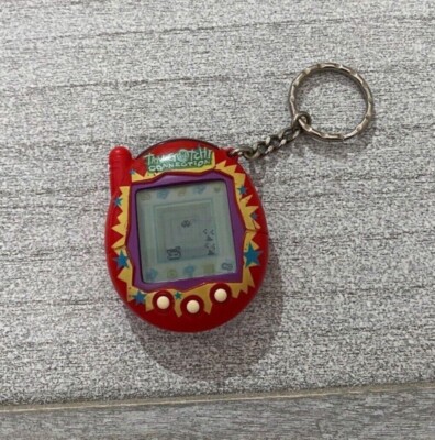 2004 BANDAI TAMAGOTCHI Connection v3 Red with Yellow Blue Stars
