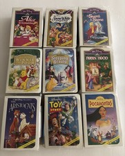 Lot of 9 Vintage NIB 1990s McDonald s Walt Disney Masterpiece Mini VHS Figures