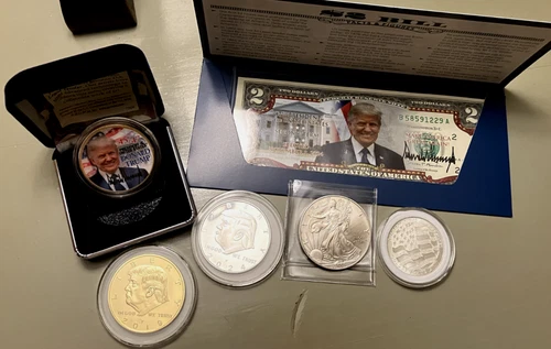 Silver Eagle (2001) unc., Silver bar & Trump collection, + a 1/2oz. silver round