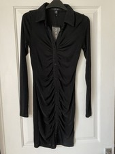 Black shirt dress, size XS, new with tags 