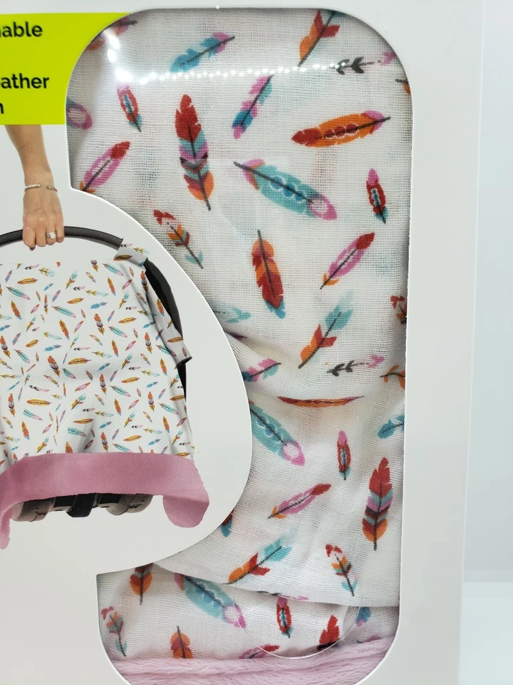 Itzy Ritzy Acogedor Asiento de Coche Infantil Toldo Muselina Plumas Flotantes Foto 3 de 4