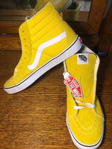 yellow and white high top vans