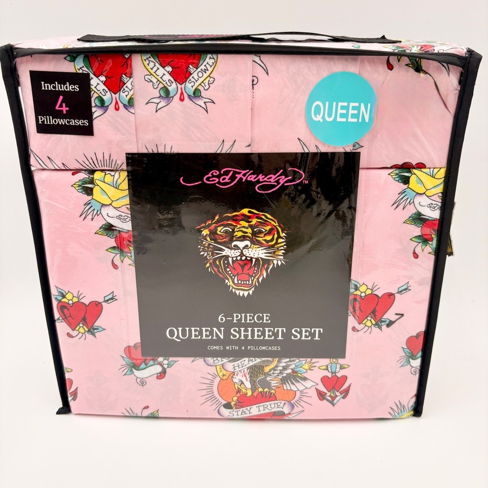 Deadstock Ed Hardy bedding with full tattoo-flash artwork — tigers, eagles, and hearts in hot pink, straight from the early-2000s fashion peak.