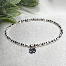 Sterling Silver Bead Elasticated Stretch Braclet With Infinity Charm