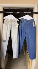vintage denim jeans, one light wash with patch and one dark wash. 1980E S Size