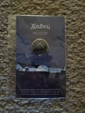 Ardbeg Scotch Whisky lapel pin, new, unopened, in original packaging, round