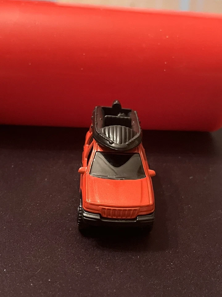 Matchbox 1999 Jeep Grand Cherokee 4x4 Red Diecast w/ Rubber Raft USED NM Cond - Image 2 of 4
