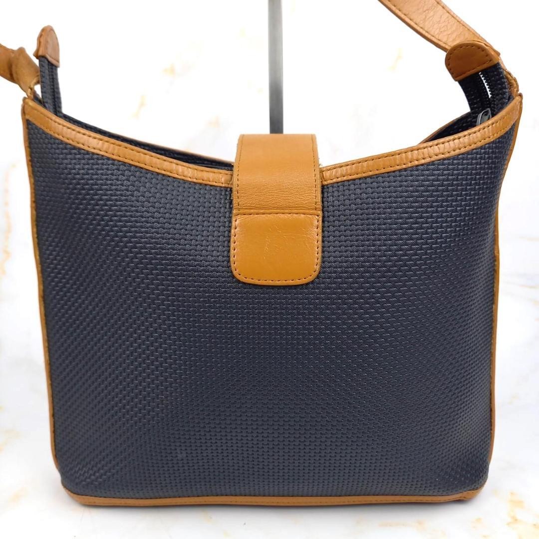 Borsa a tracolla Yves Saint Laurent vintage in pelle secchiello marrone nero YSL Cassandra
