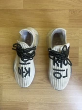 Size 10.5 - adidas Pharrell x NMD Human Race Cream