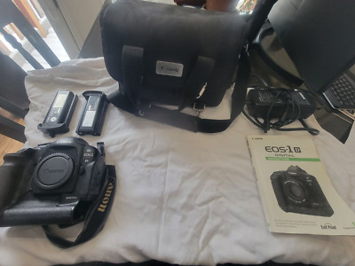   11,392 shutter clicks! Canon EOS 1Ds Camera, w/ case, 2 bats, charger & manal