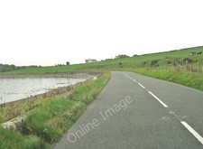 Photo 12x8 A718 at Wig Bay Kirkcolm As the road skirts around the bay, it  c2010