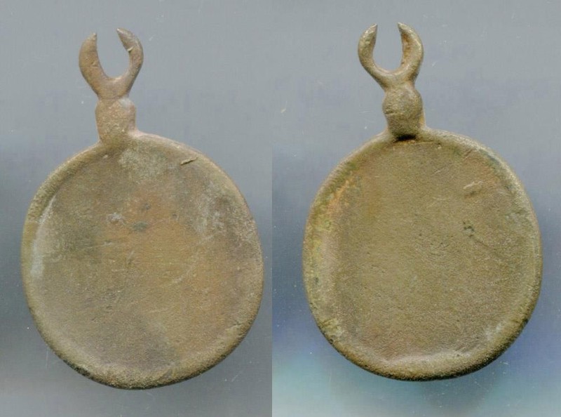 (33441) Central Asia. AE pendant, amulet