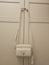 Calvin Klein beige cream twist lock camera crossbody strap bag