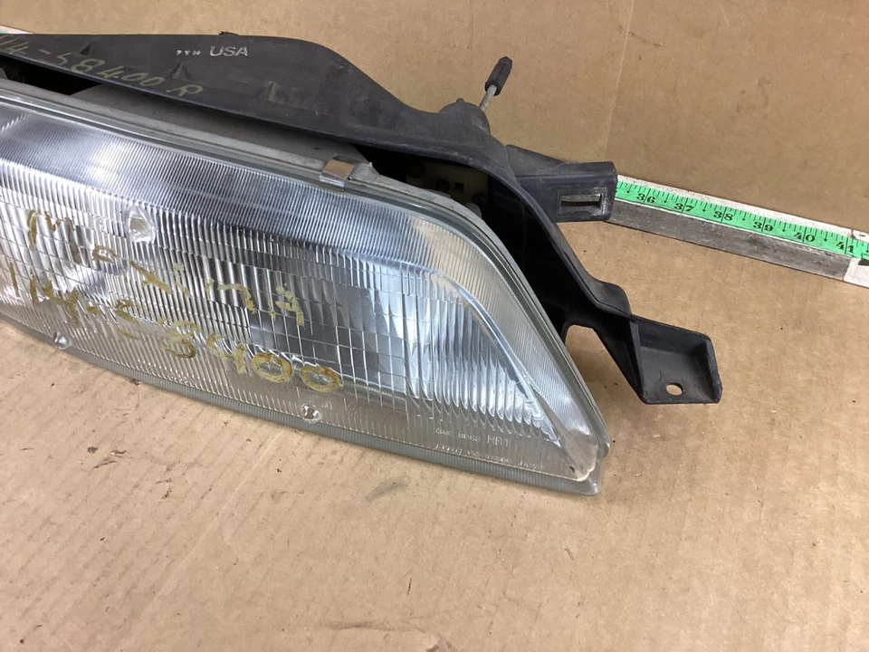 Farol dianteiro direito do passageiro Nissan Maxima 1995-1996 2601040U26 fabricante de equipamento original - Imagem 4 de 4