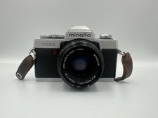 Minolta XG-1 35mm Film Camera w/ 45mm ROKKOR F/2  SIGMA 80-200mm F/3.5-4  MORE