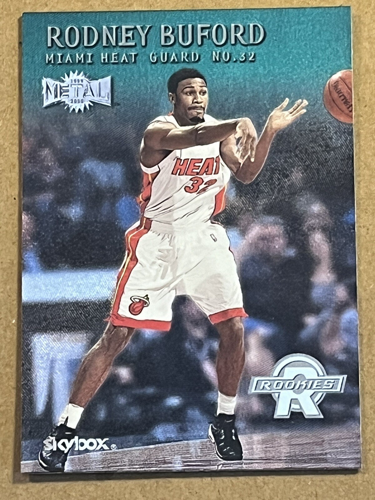 1999-00 SKYBOX METAL - EMERALD PARALLEL - RODNEY BUFORD HEAT ROOKIE #176