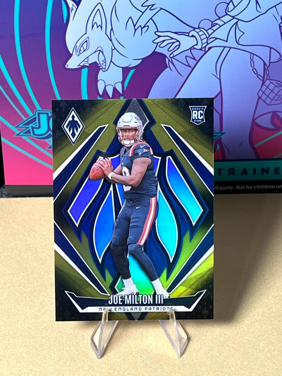 2024 Panini Phoenix - Rookies Joe Milton III #205 Bronze Fade /125 (RC)