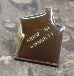 Grow in Gwinnett vintage pin badge