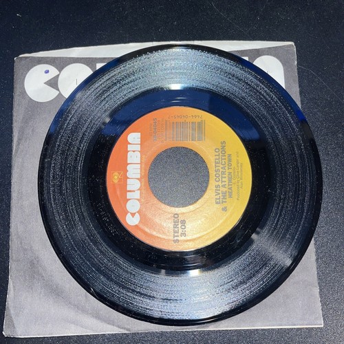 ELVIS COSTELLO & THE ATTRACTIONS EVERYDAY I WRITE THE BOOK / HEATHEN TOWN 45 RPM - Foto 2 di 2