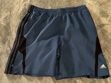 Adidas men  s athletic shorts in blue with black stripe detailing. Size Large.
