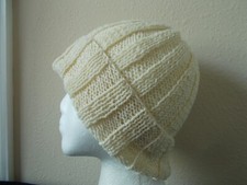 Hand knitted elegant and warm 100 wool beanie/hat, off white/cream