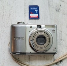 Canon PowerShot A1100 IS 12.1MP Silver Digital Camera - Tested Working W/ SD