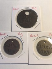 Three Brass Tags
