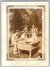 Vtg B&W Snapshot 3 Young Men Eating Picnic Meal Outdoors Table Sepia 1920s Photo